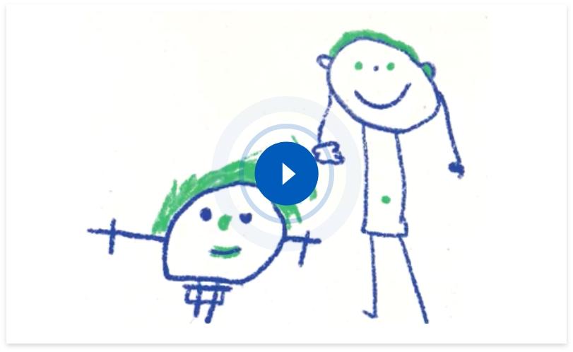 Student practicing handwriting at a desk while teacher observes, illustrating the impact of handwriting instruction on student writing skills and academic performance.