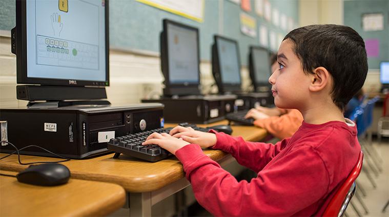 Student on the computer using Keyboarding Without Tears